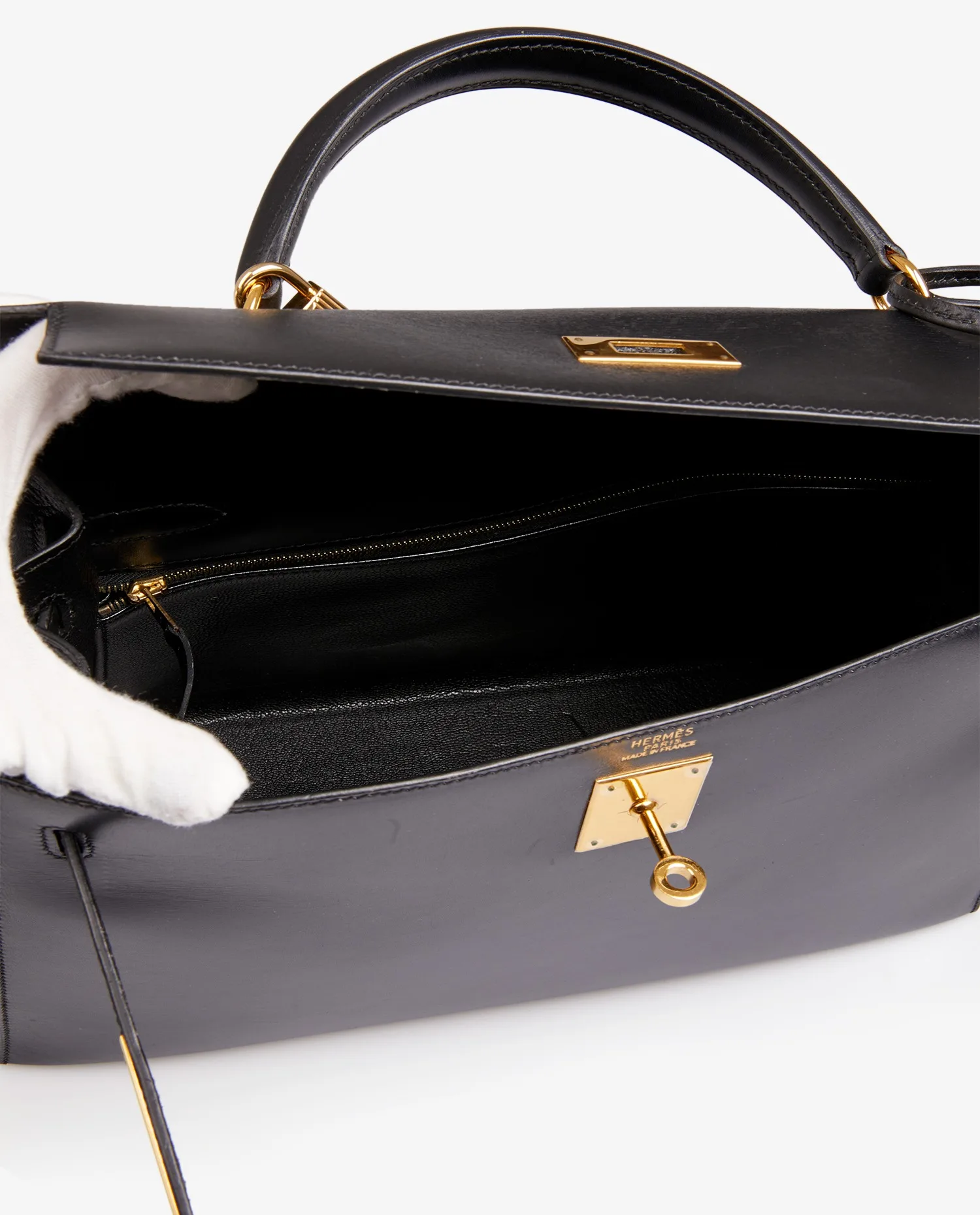Sac Kelly 32 sellier Hermès box noir vue de l'intérieur